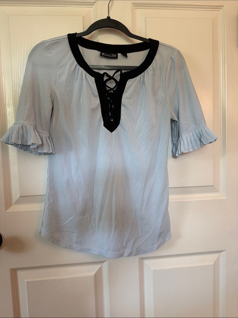Light Blue Pinstripe Blouse with Black Lace-Up Trim
